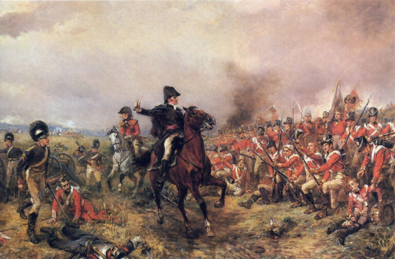 Wellington en Waterloo por Robert Hillingford que muestra a Wellington con un vestido negro y un sombrero de tres picos a caballo alentando a los soldados de a pie que luchan frente a él